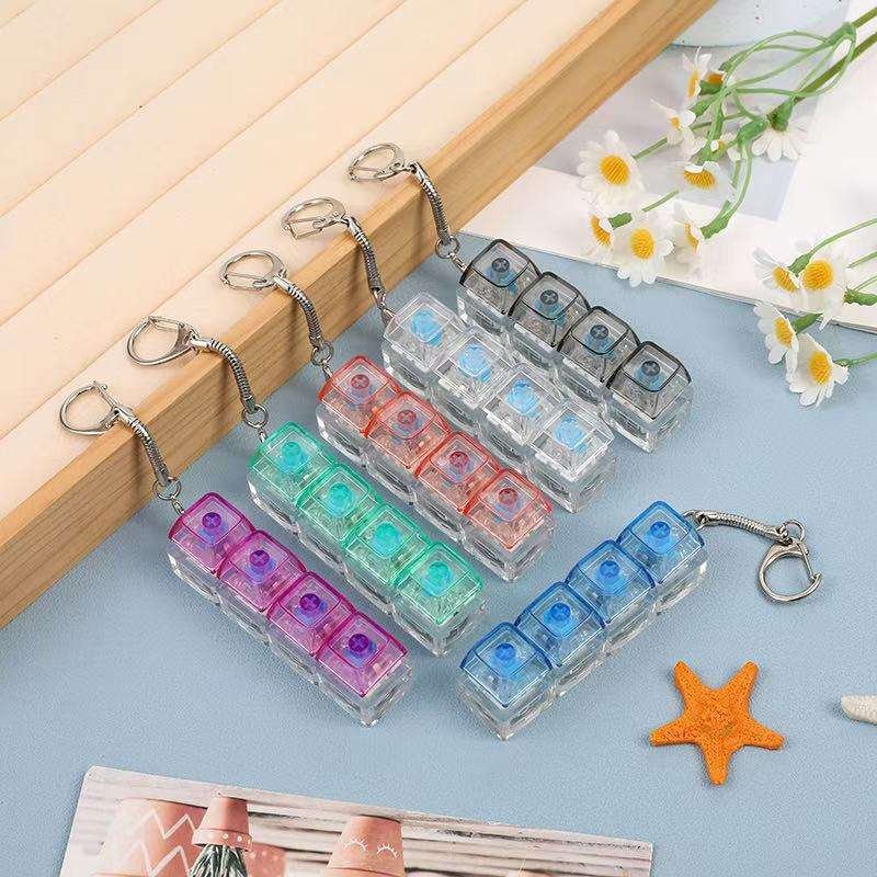 Novacross Plastic Squeezable Stress Relieving Toy Mechanical Keyboard Switch Creative Key Chain with Led Light Unisex